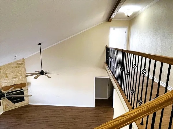 a kitchen with stainless steel appliances a refrigerator stove and microwave