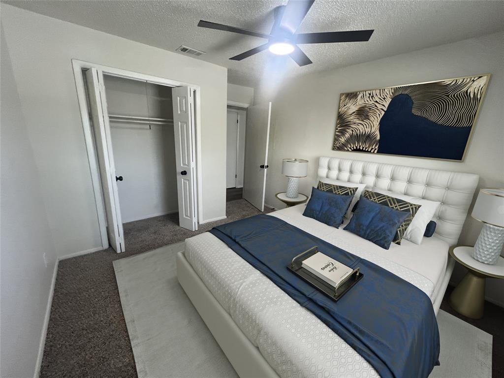 4639 Williams Road, Unit 113 Benbrook, TX 76116 - Photo 5 of 13 a living room with a bed