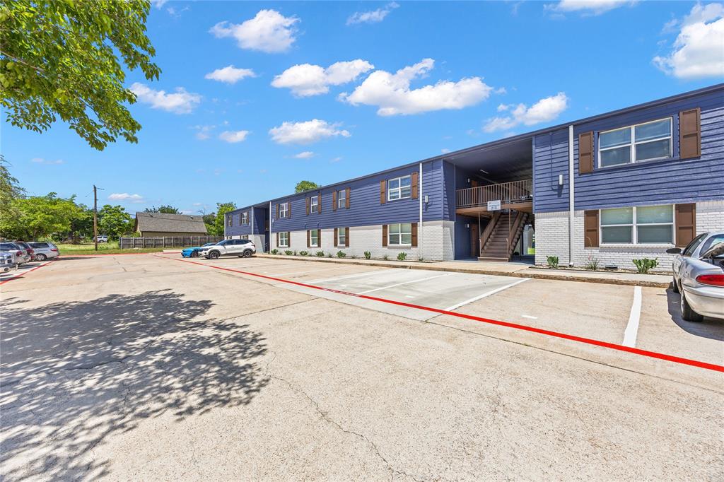 4639 Williams Road, Unit 113 Benbrook, TX 76116 - Photo 9 of 13 a view of a building with a street