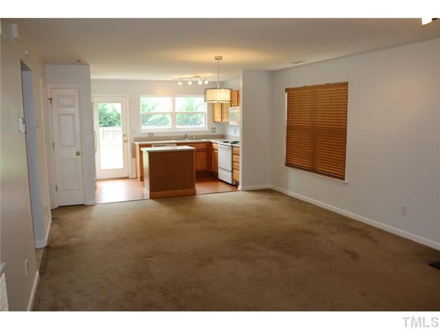 3333 Deering Drive Raleigh, NC 27616 - Photo 3 of 10 a view of an empty room with a kitchen