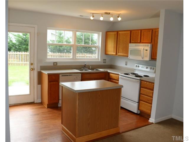 3333 Deering Drive Raleigh, NC 27616 - Photo 4 of 10 a kitchen that has a sink a stove and a microwave