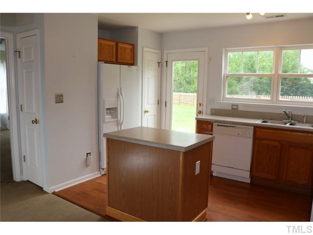 3333 Deering Drive Raleigh, NC 27616 - Photo 5 of 10 a kitchen with a sink and cabinets