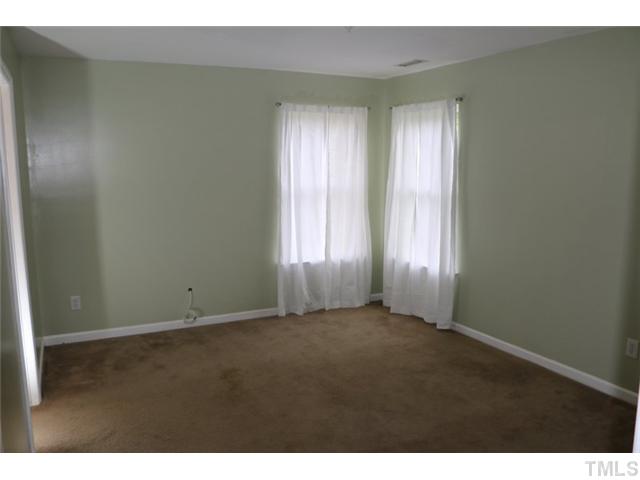 3333 Deering Drive Raleigh, NC 27616 - Photo 6 of 10 a view of an empty room with windows