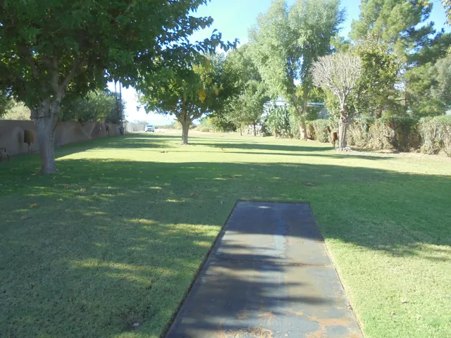 a view of swimming pool with an outdoor space and seating area
