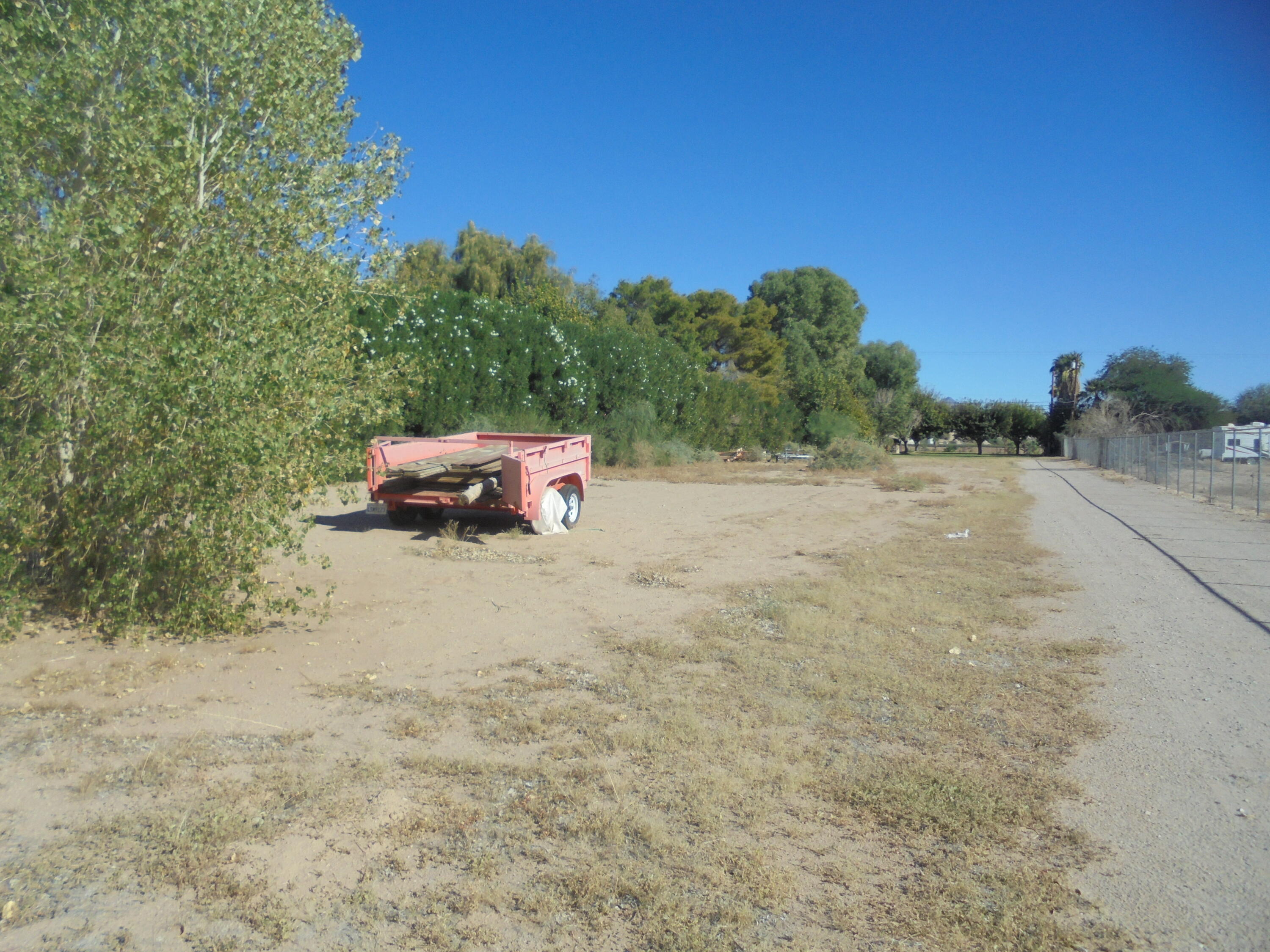654 Riviera Drive Blythe, CA 92225 - Photo 32 of 39 a view of a yard with an outdoor space