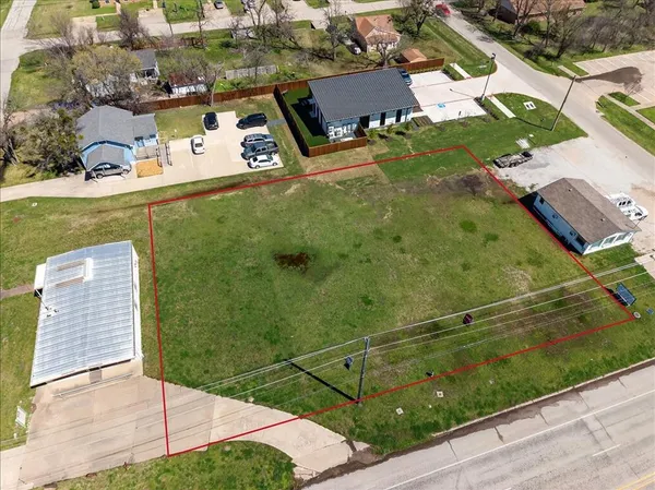 an aerial view of a house with a garden