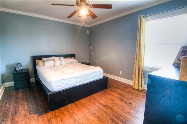 1210 Palmer Road Lebanon, TN 37090 - Photo 17 of 20 a bed sitting in a bedroom next to a window