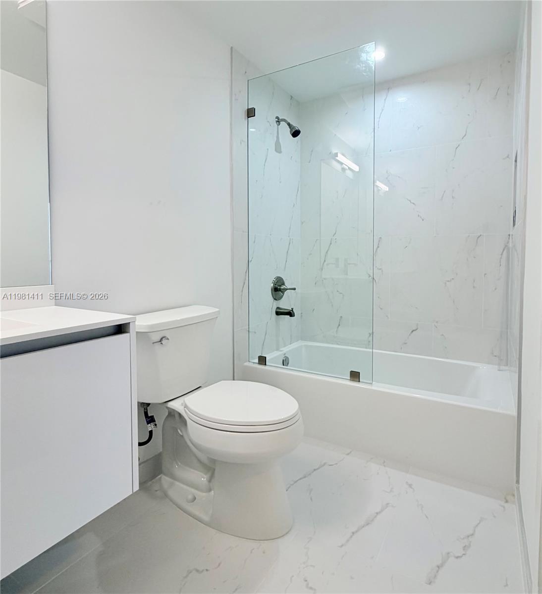 5077 Northwest 7th Street, Unit 706 Miami, FL 33126 - Photo 12 of 23 Master Bath