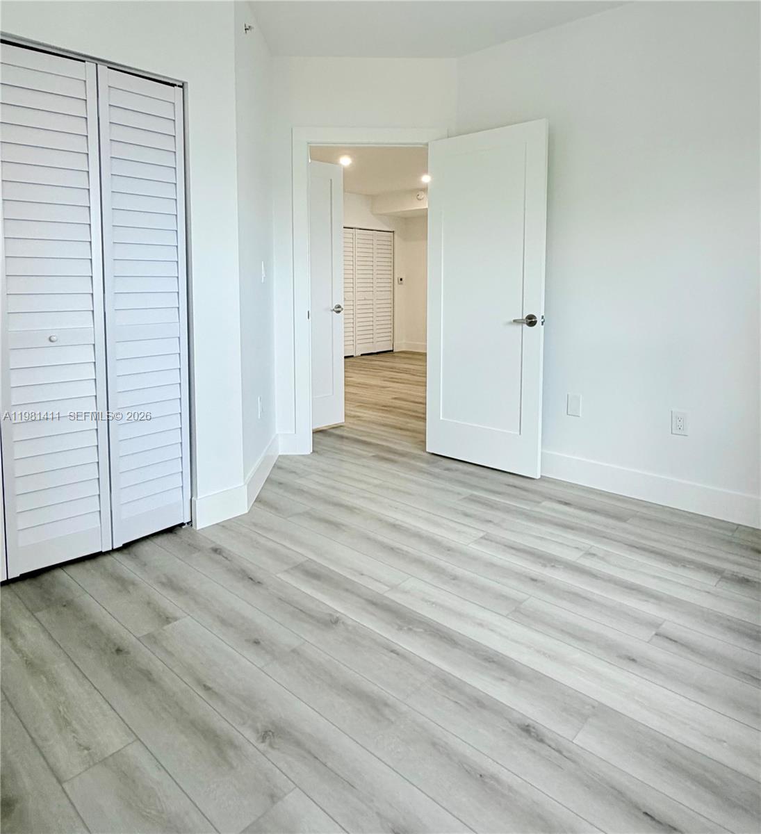 5077 Northwest 7th Street, Unit 706 Miami, FL 33126 - Photo 14 of 23 2nd bedroom