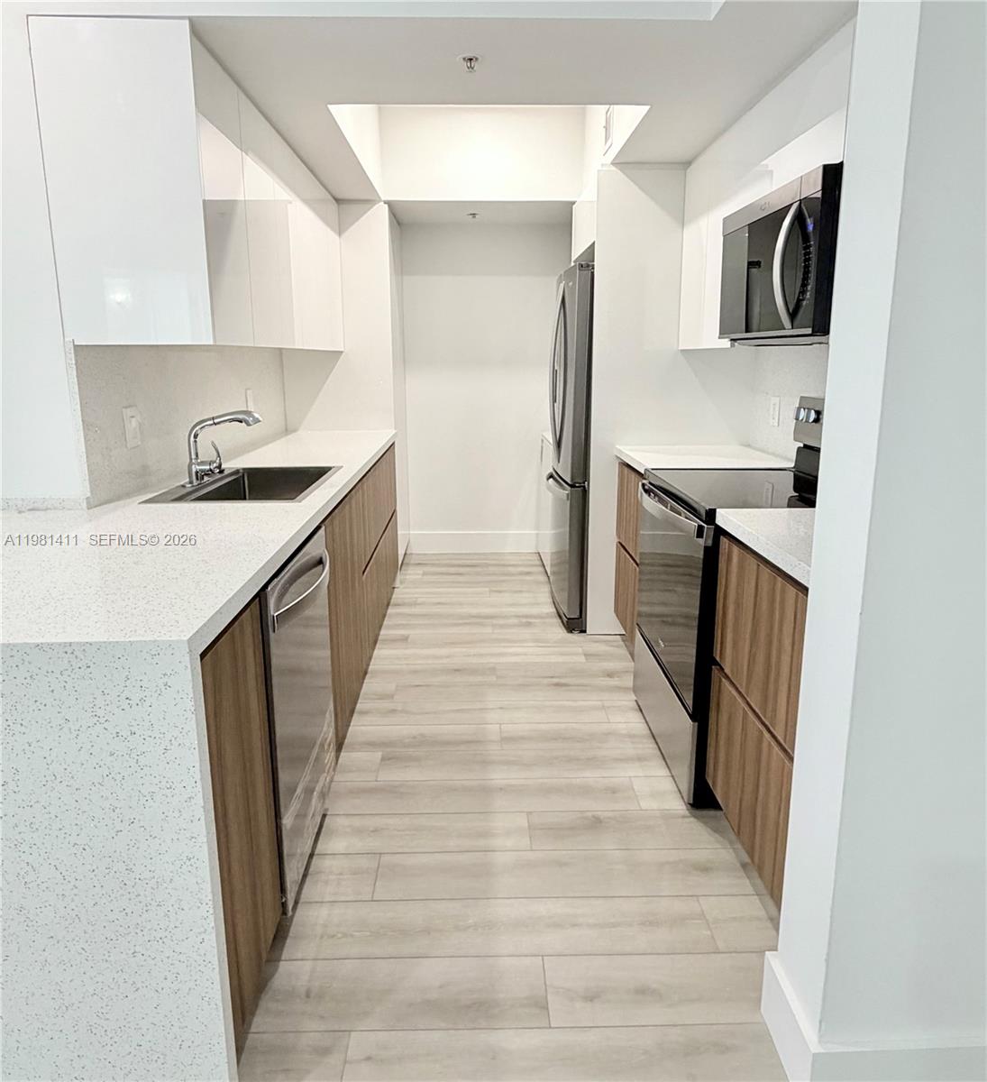 5077 Northwest 7th Street, Unit 706 Miami, FL 33126 - Photo 3 of 23