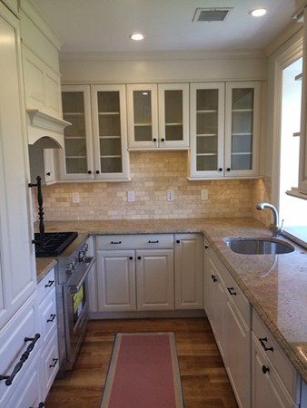 447 Beacon Street, Unit 3 Boston, MA 02115 - Photo 2 of 7 a kitchen that has a sink and a stove
