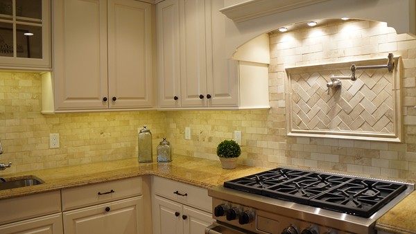 447 Beacon Street, Unit 3 Boston, MA 02115 - Photo 6 of 7 a kitchen with a stove and cabinets