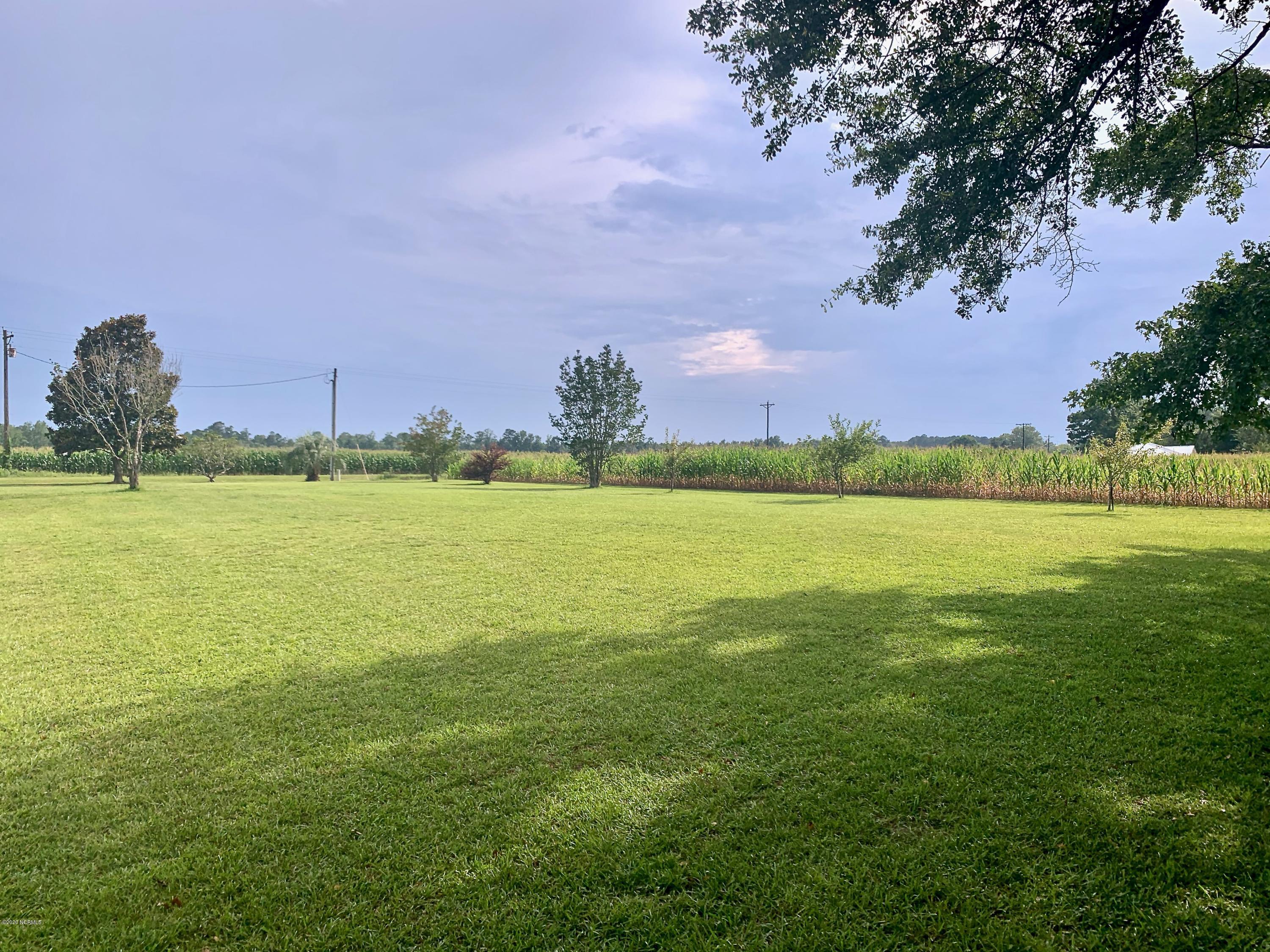 5036 Mill Branch Road Northwest Ash, NC 28420 - Photo 11 of 31 You will enjoy the peaceful open views with delightful apple trees!
