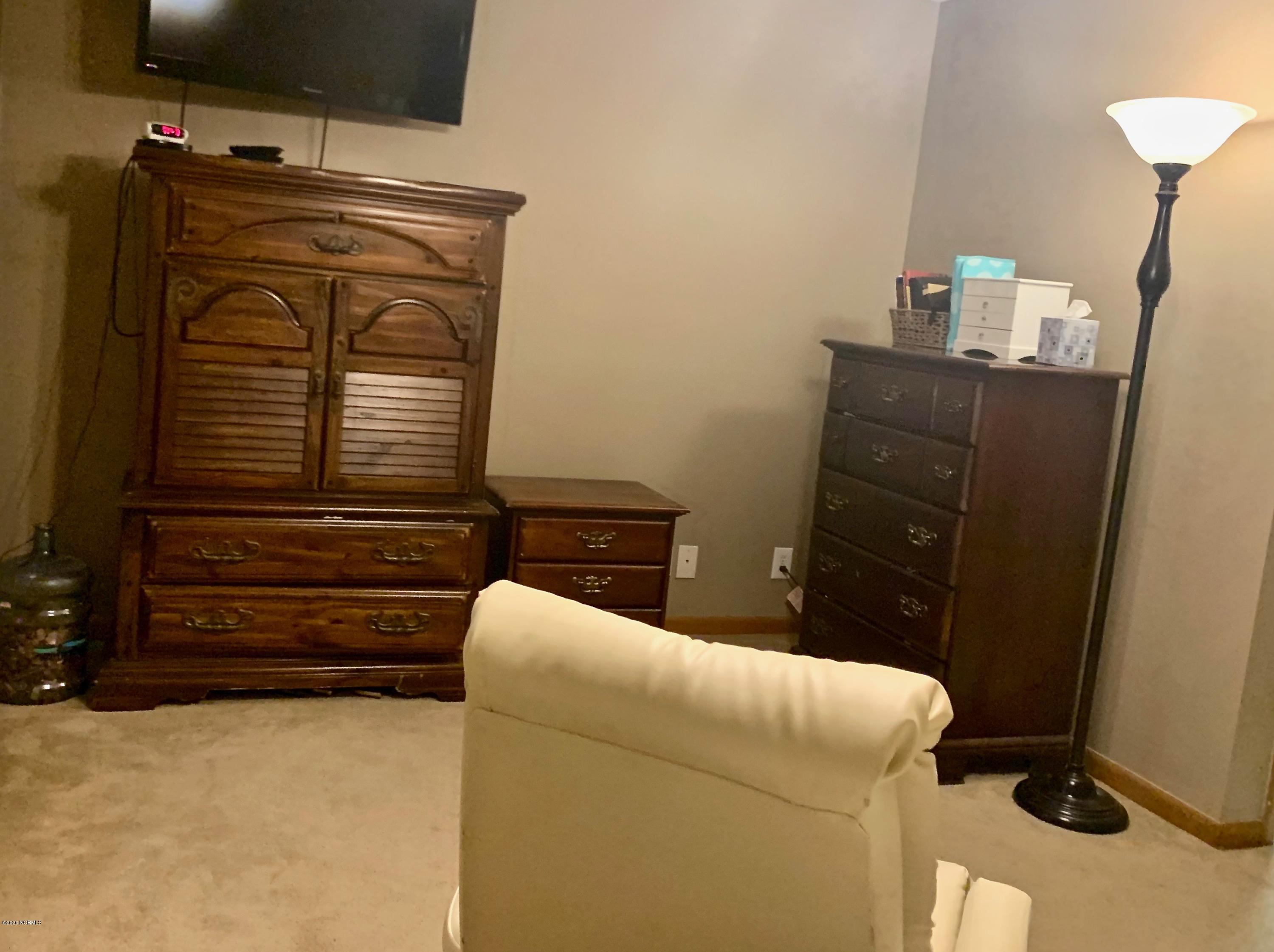5036 Mill Branch Road Northwest Ash, NC 28420 - Photo 22 of 31 Primary bedroom suite.