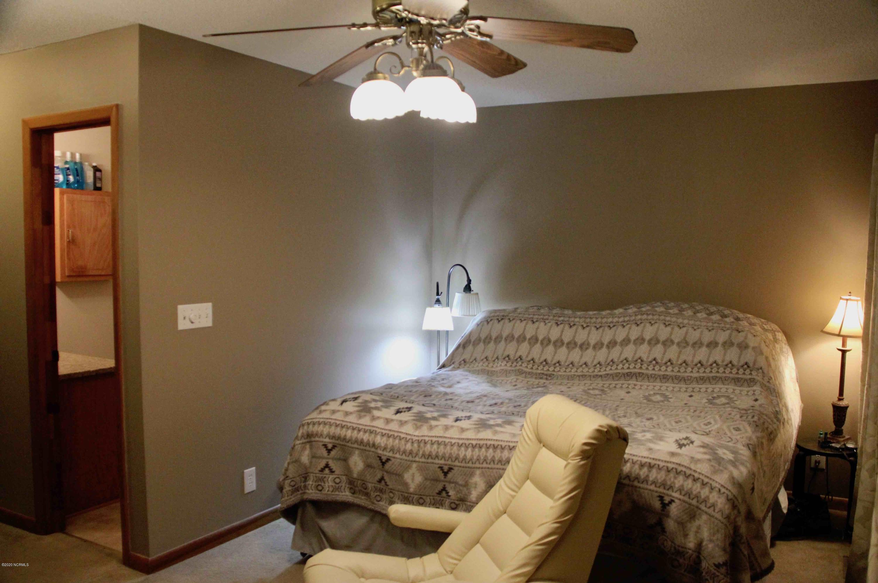 5036 Mill Branch Road Northwest Ash, NC 28420 - Photo 23 of 31 Primary bedroom with walk in closet