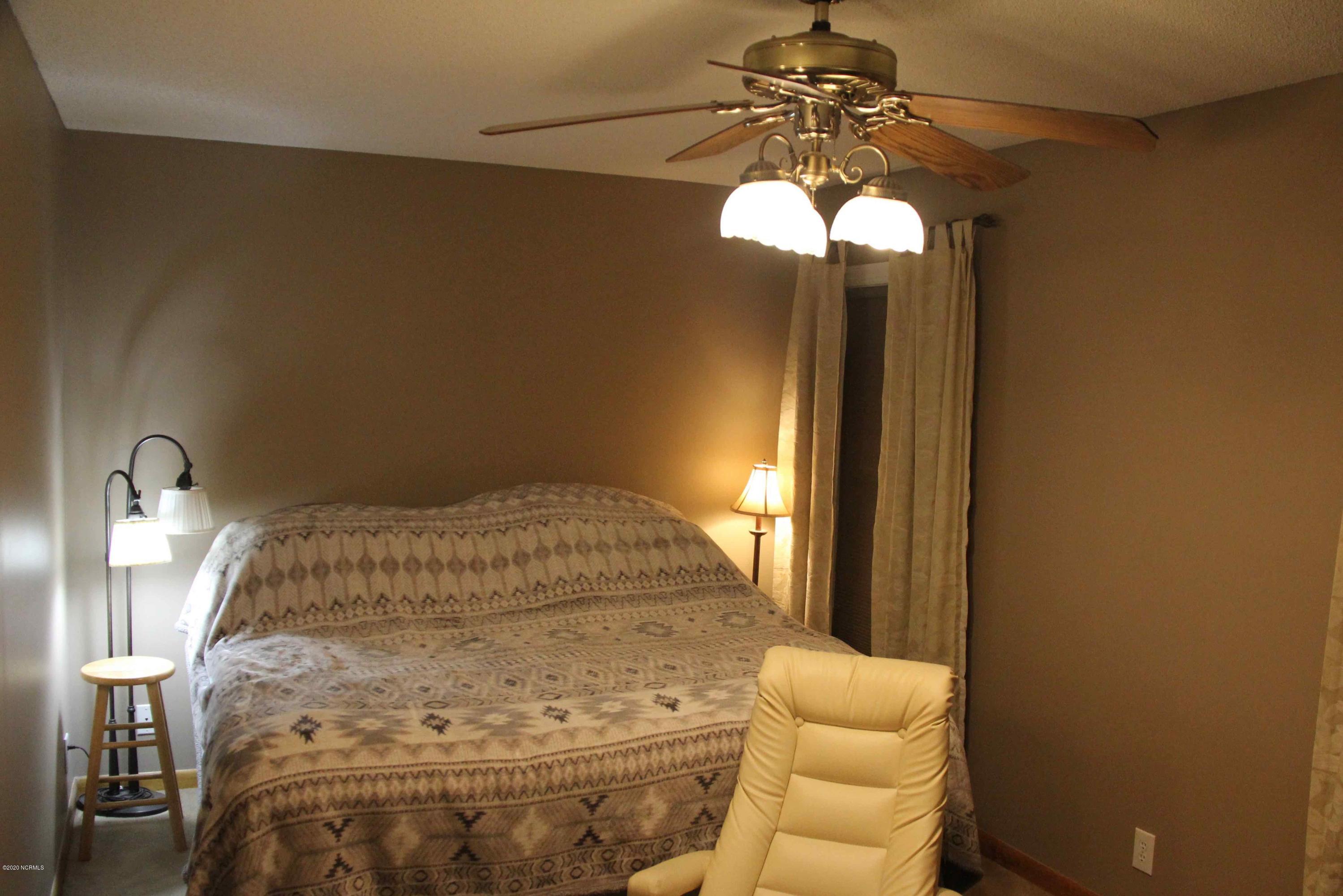 5036 Mill Branch Road Northwest Ash, NC 28420 - Photo 24 of 31 Master Bedroom2