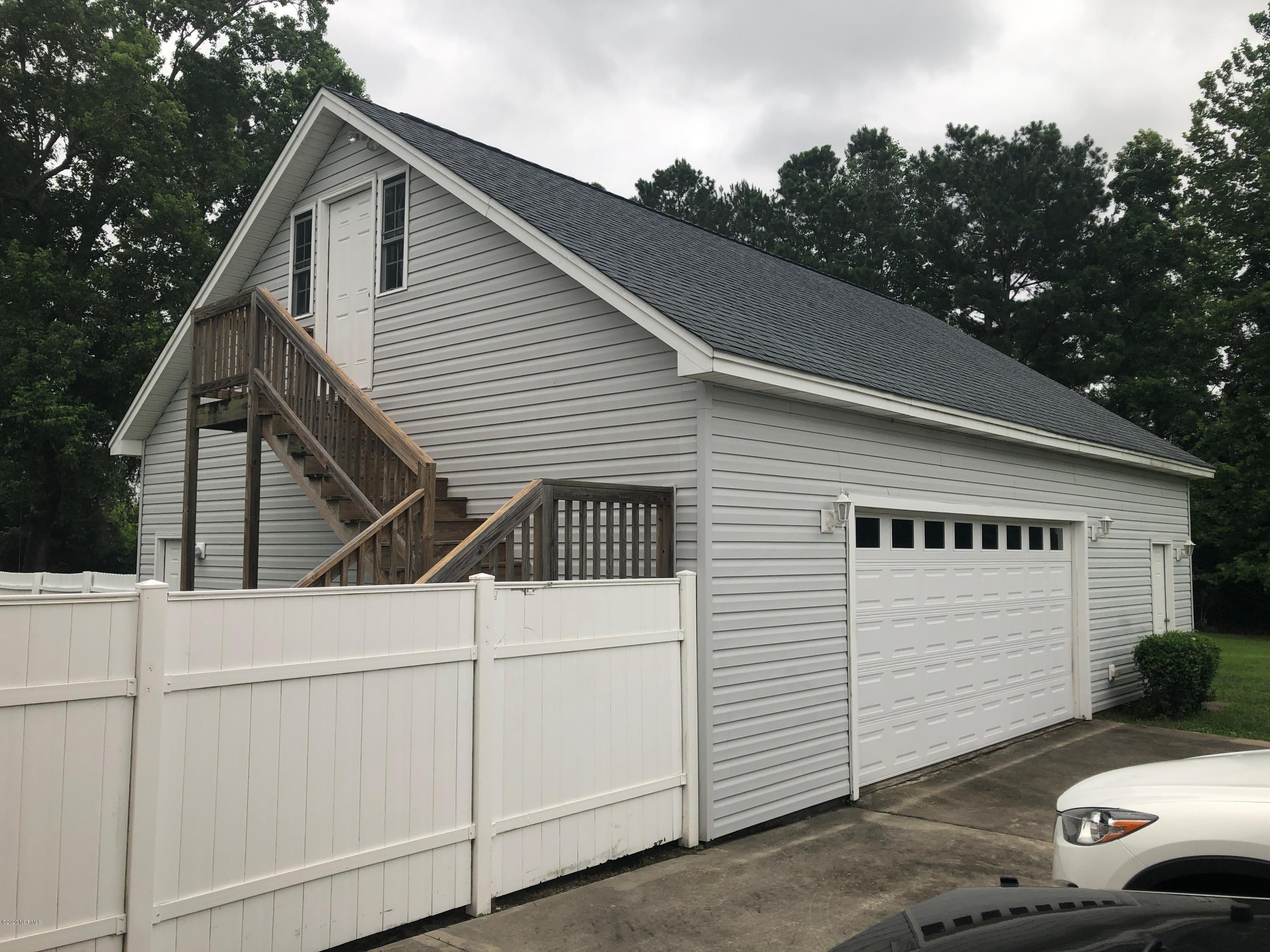 5036 Mill Branch Road Northwest Ash, NC 28420 - Photo 6 of 31 3 + car detached garage with large workshop/storage room. Built 2012