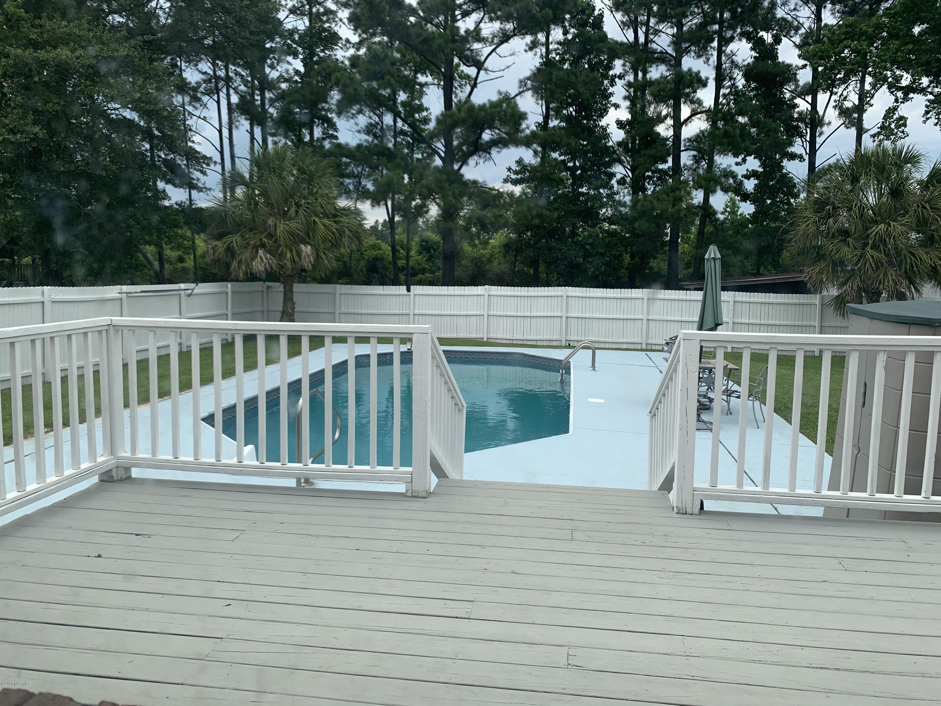 5036 Mill Branch Road Northwest Ash, NC 28420 - Photo 10 of 31 Sit back, relax and enjoy your pool time!