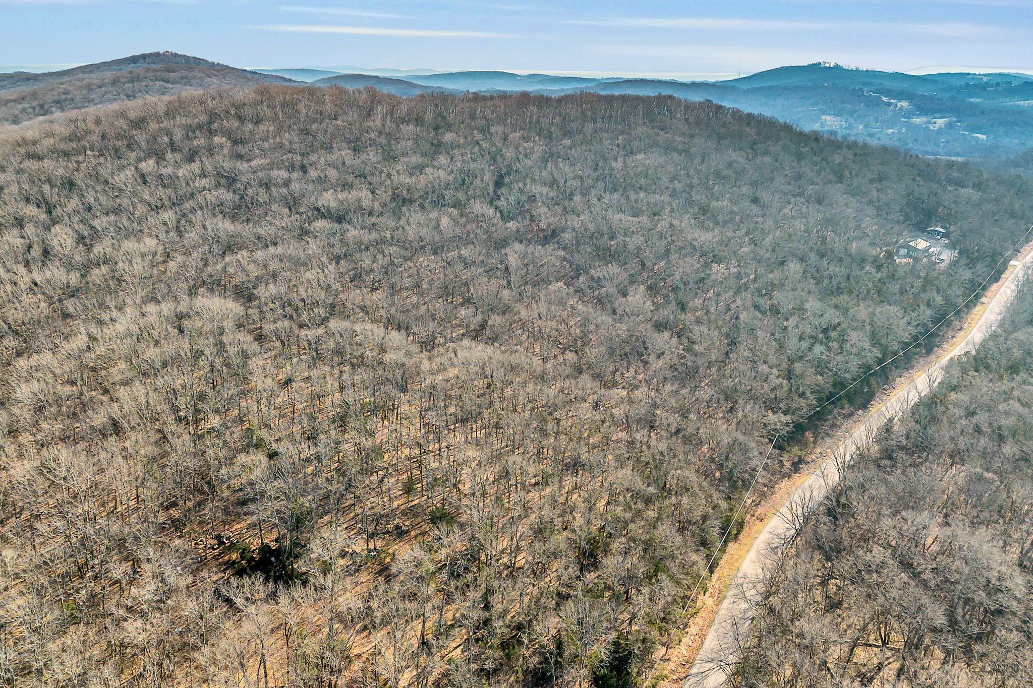 0 Sanford Road Nolensville, TN 37135 - Photo 14 of 14 a view of a dry yard with mountains in the background