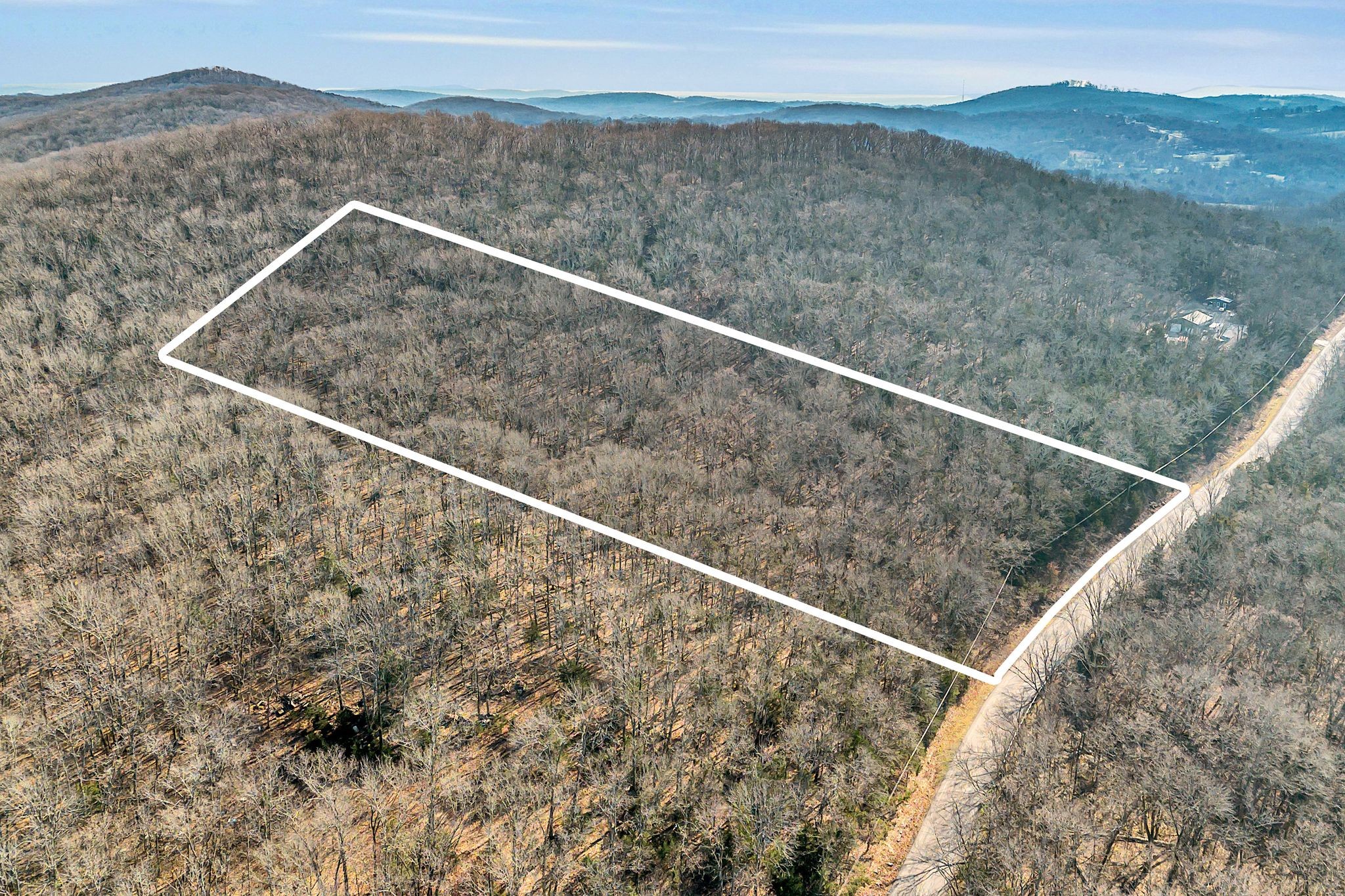 0 Sanford Road Nolensville, TN 37135 - Photo 2 of 14 a view of a dry yard with a mountain