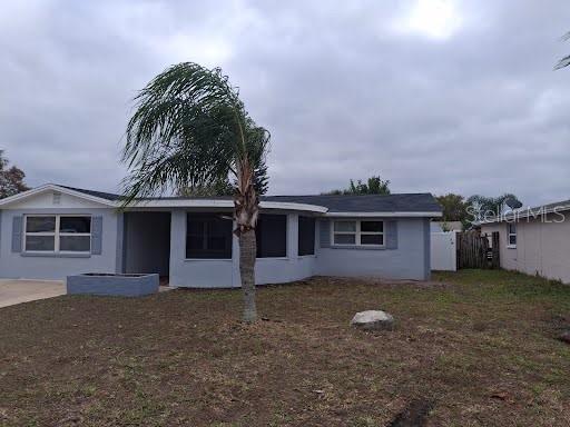 3538 Garfield Drive Holiday, FL 34691 - Photo 2 of 16 front view of a house with a yard
