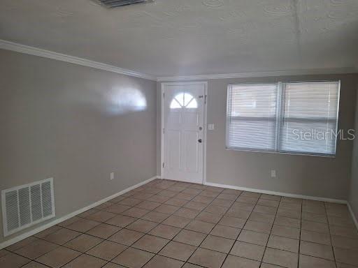 3538 Garfield Drive Holiday, FL 34691 - Photo 4 of 16 a view of an empty room and window