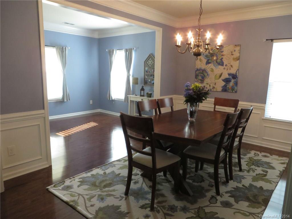 3005 Fallondale Road Waxhaw, NC 28173 - Photo 4 of 20 a view of a dining room with furniture and chandelier