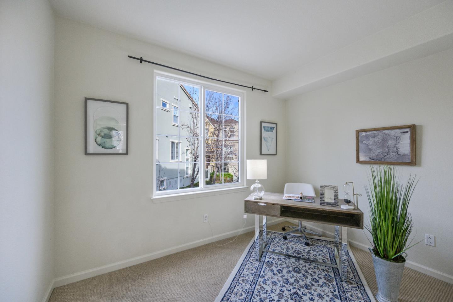 4517 Lick Mill Boulevard Santa Clara, CA 95054 - Photo 16 of 38 a living room with furniture and a window