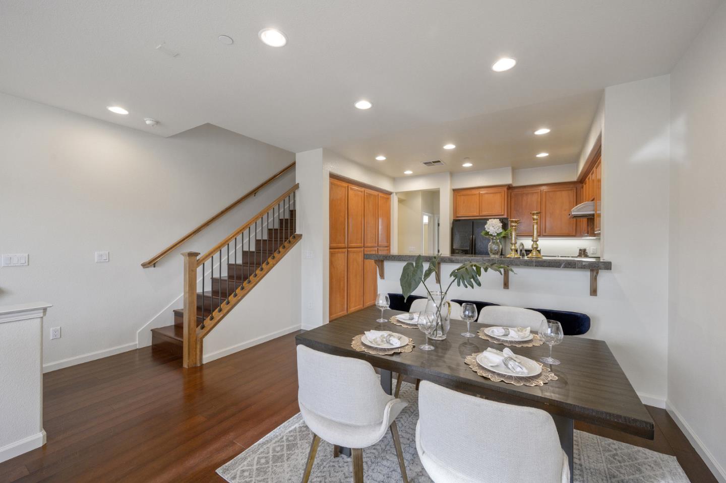 4517 Lick Mill Boulevard Santa Clara, CA 95054 - Photo 9 of 38 a dining room with furniture and wooden floor