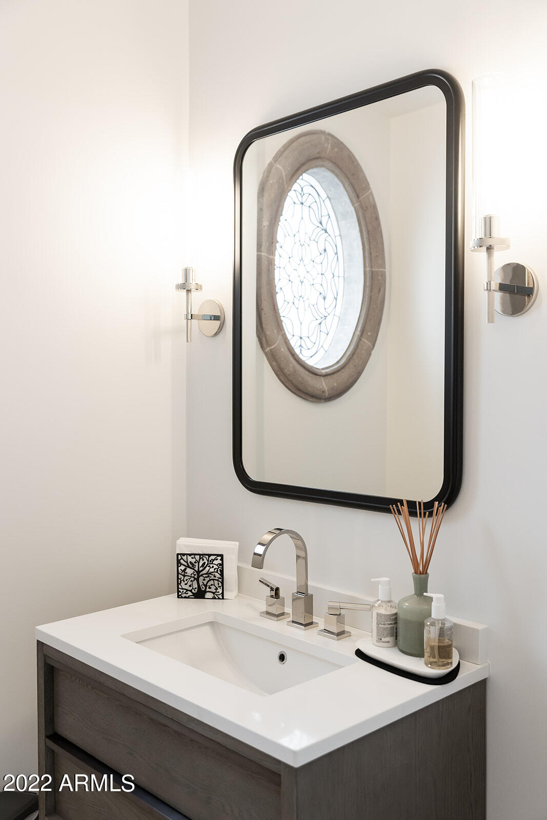 6271 East Horseshoe Road Paradise Valley, AZ 85253 - Photo 13 of 16 a bathroom with a sink and a mirror