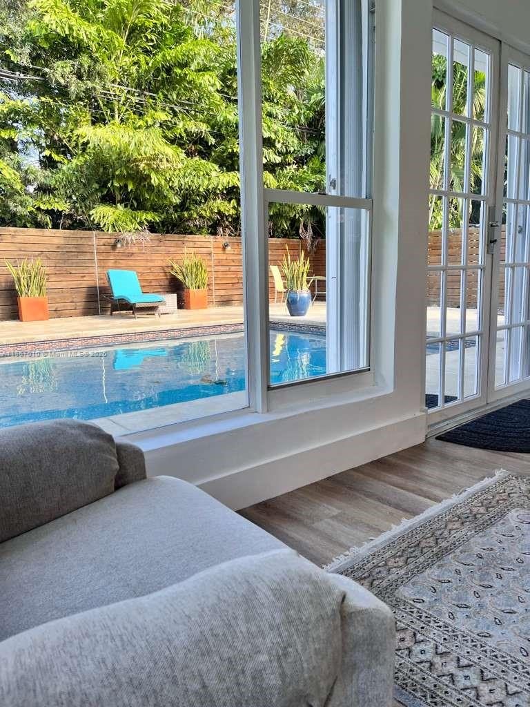 3911 Southwest 61st Avenue Miami, FL 33155 - Photo 14 of 38 a view of swimming pool from a balcony