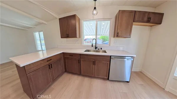 a bathroom with a double vanity sink and mirror