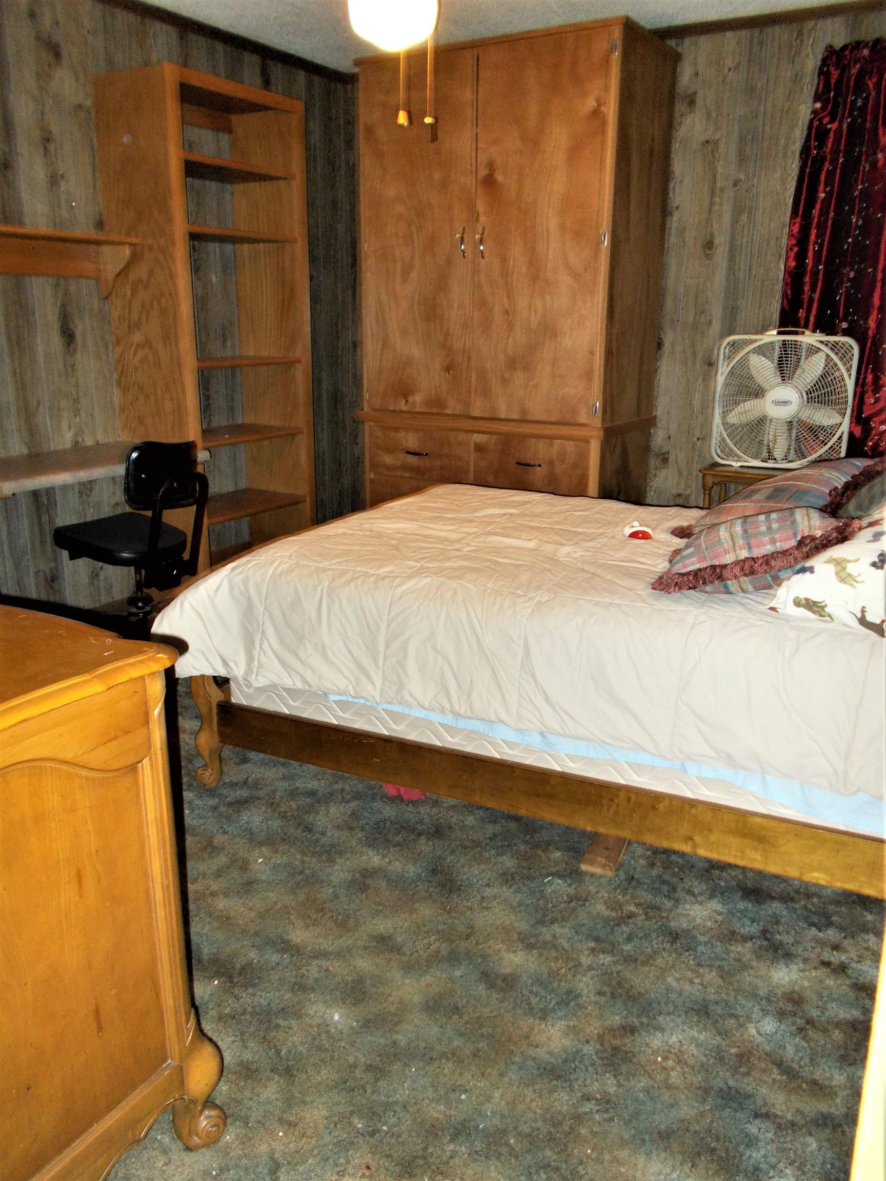 1058 Thumb Road Henning, TN 38041 - Photo 19 of 25 a bedroom with a bed and a dresser