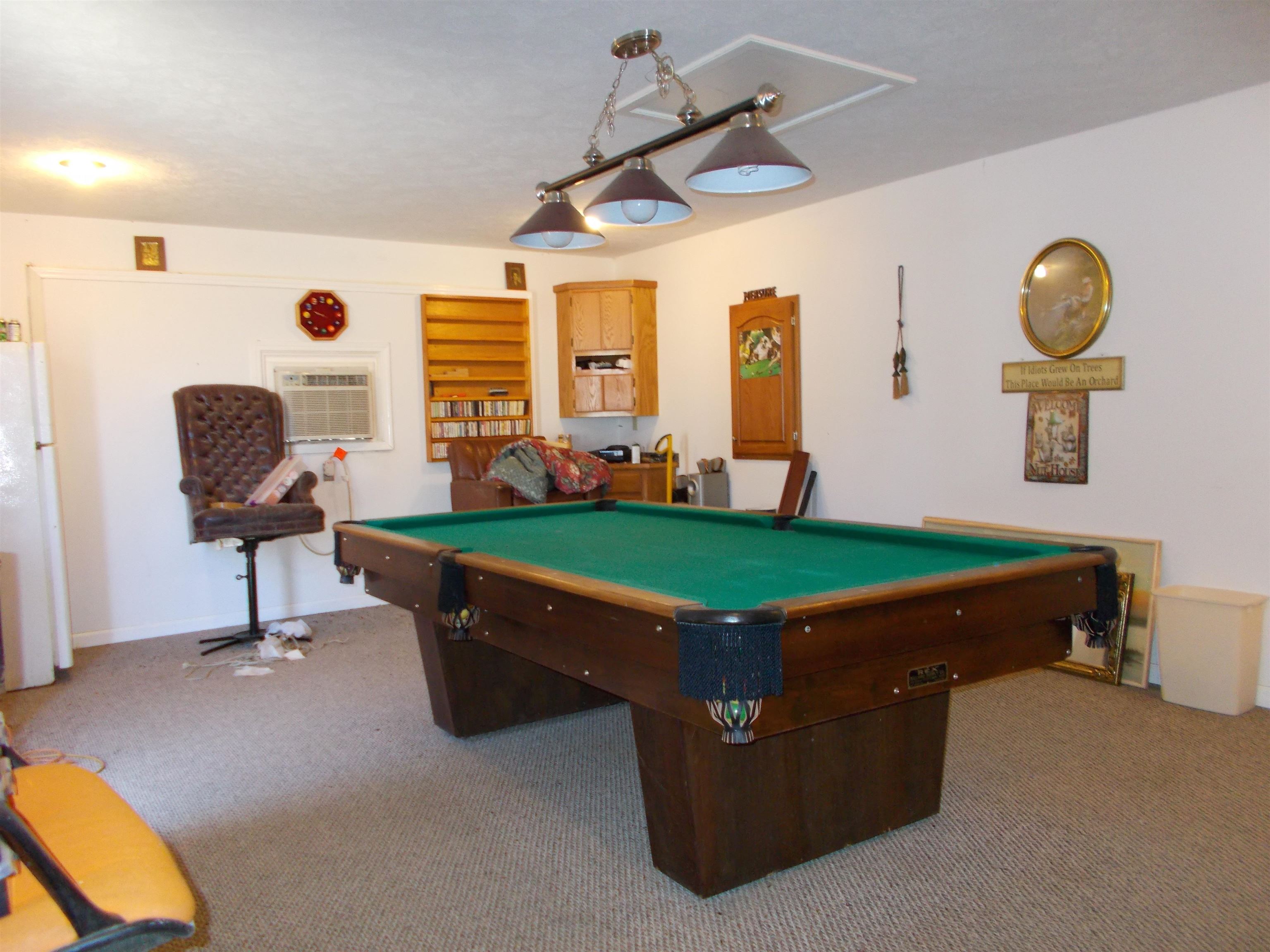 1058 Thumb Road Henning, TN 38041 - Photo 6 of 25 a room with pool table and windows