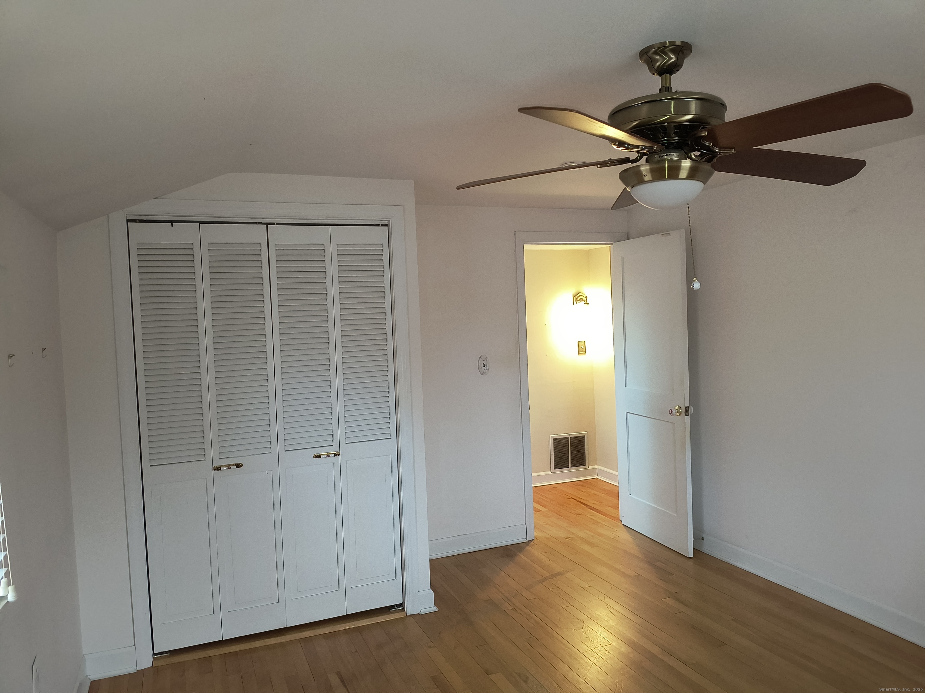 28 McLaughlin Terrace Derby, CT 06418 - Photo 16 of 37 a view of empty room with wooden floor