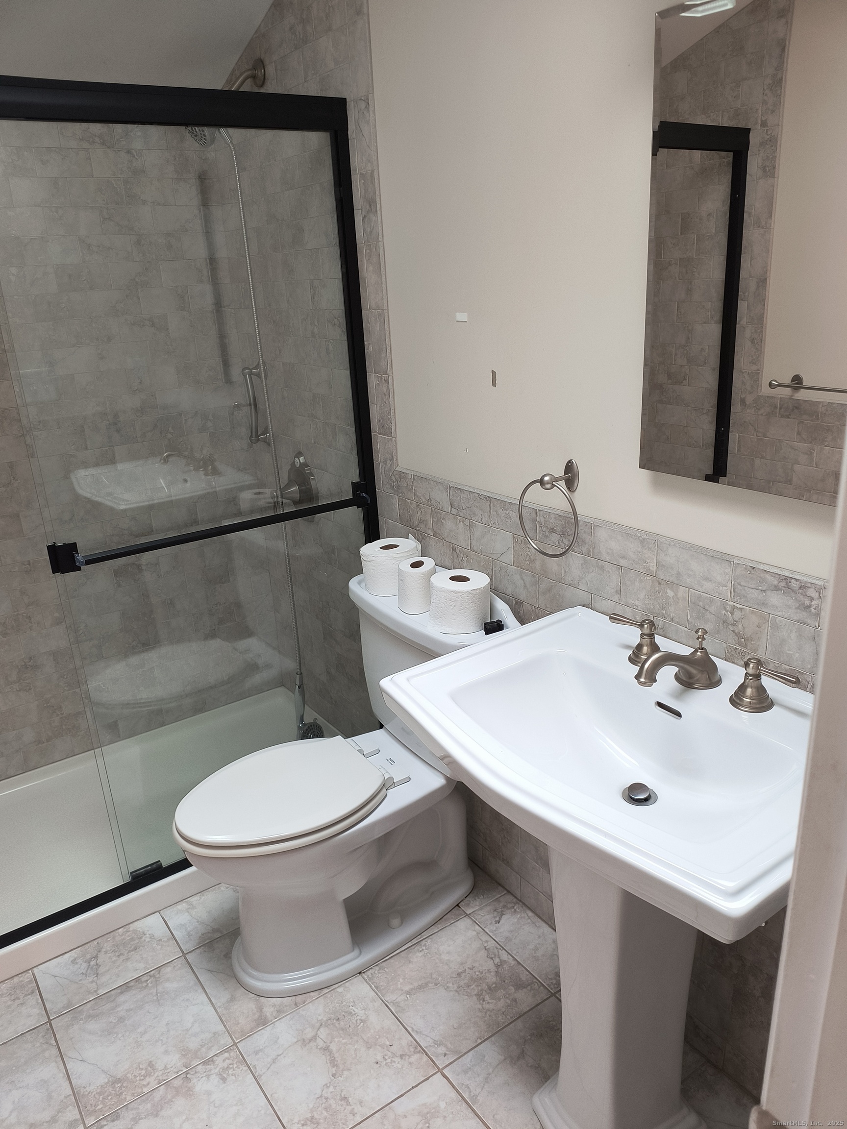 28 McLaughlin Terrace Derby, CT 06418 - Photo 21 of 37 a bathroom with a sink toilet and shower