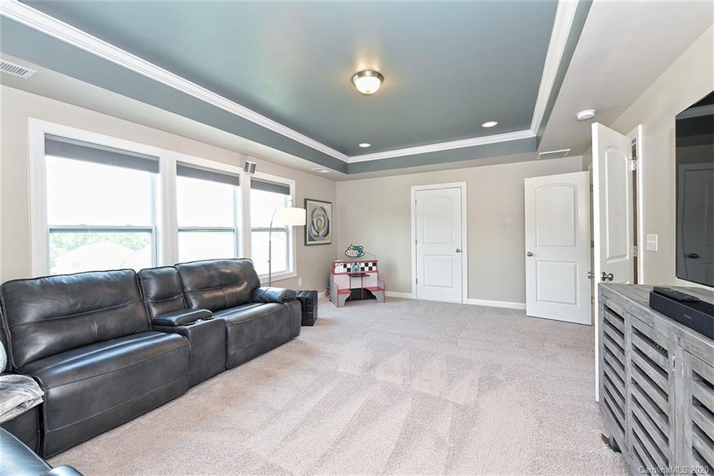 5321 Meadowcroft Way Fort Mill, SC 29708 - Photo 25 of 36 a living room with furniture and a window