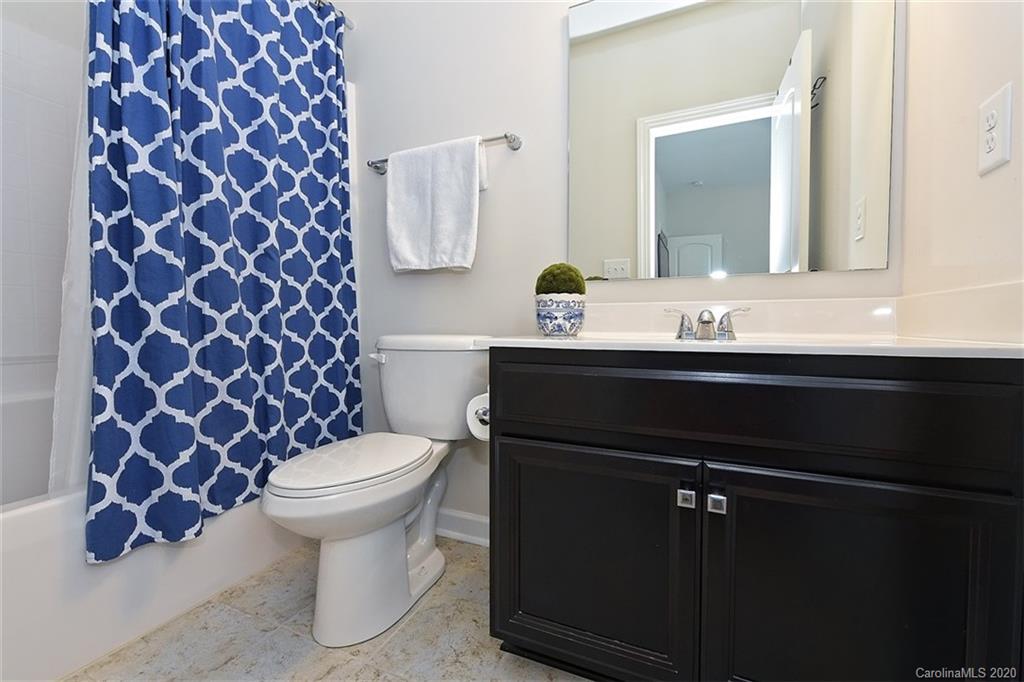 5321 Meadowcroft Way Fort Mill, SC 29708 - Photo 29 of 36 a bathroom with a sink toilet and mirror