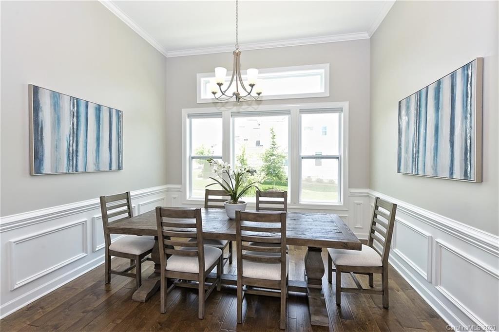 5321 Meadowcroft Way Fort Mill, SC 29708 - Photo 7 of 36 a view of a dining room with furniture window and wooden floor