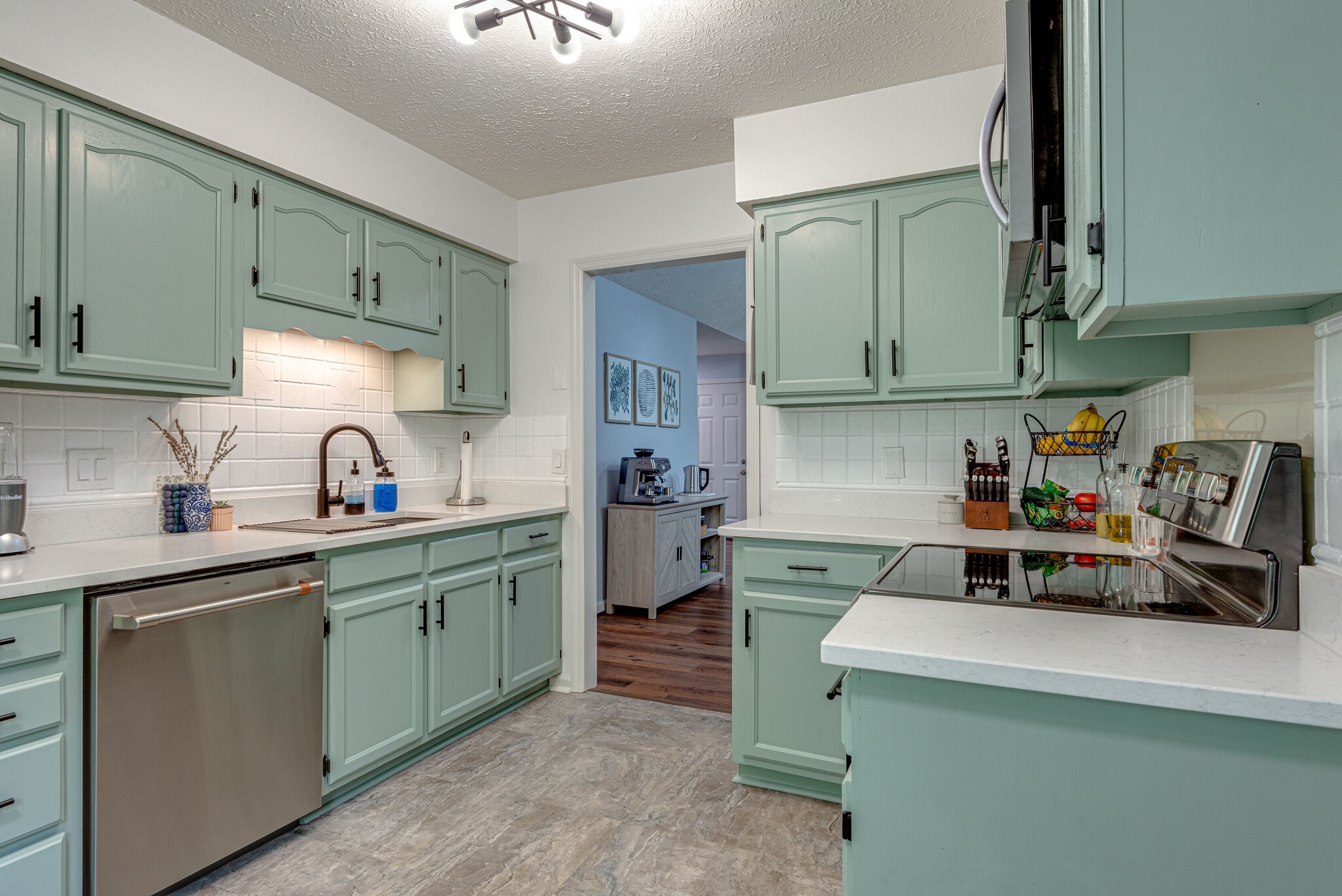 385 Cedarcliff Road Antioch, TN 37013 - Photo 11 of 29 a kitchen with a sink cabinets and a window