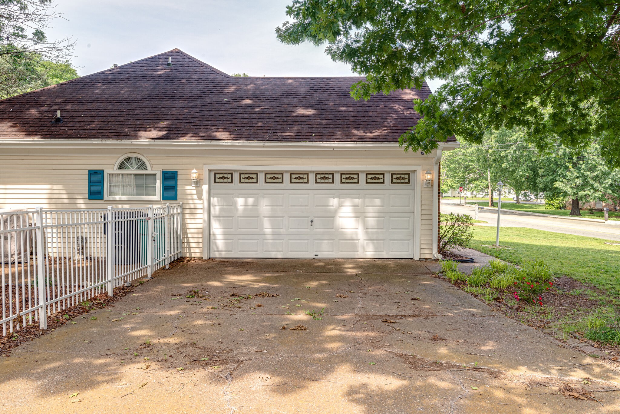 385 Cedarcliff Road Antioch, TN 37013 - Photo 28 of 29 a front view of a house with a yard and garage