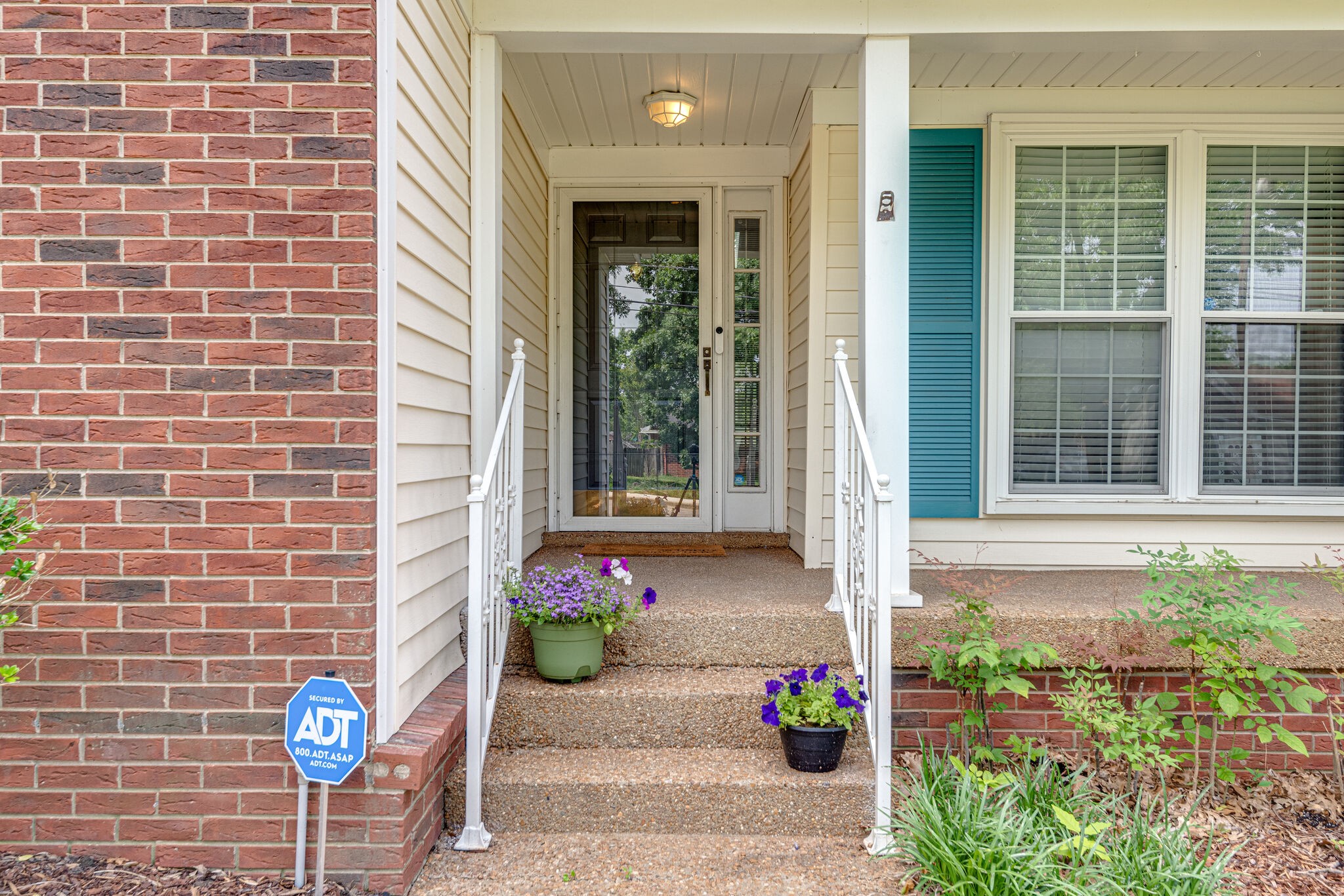 385 Cedarcliff Road Antioch, TN 37013 - Photo 3 of 29 a front view of a house with outdoor seating