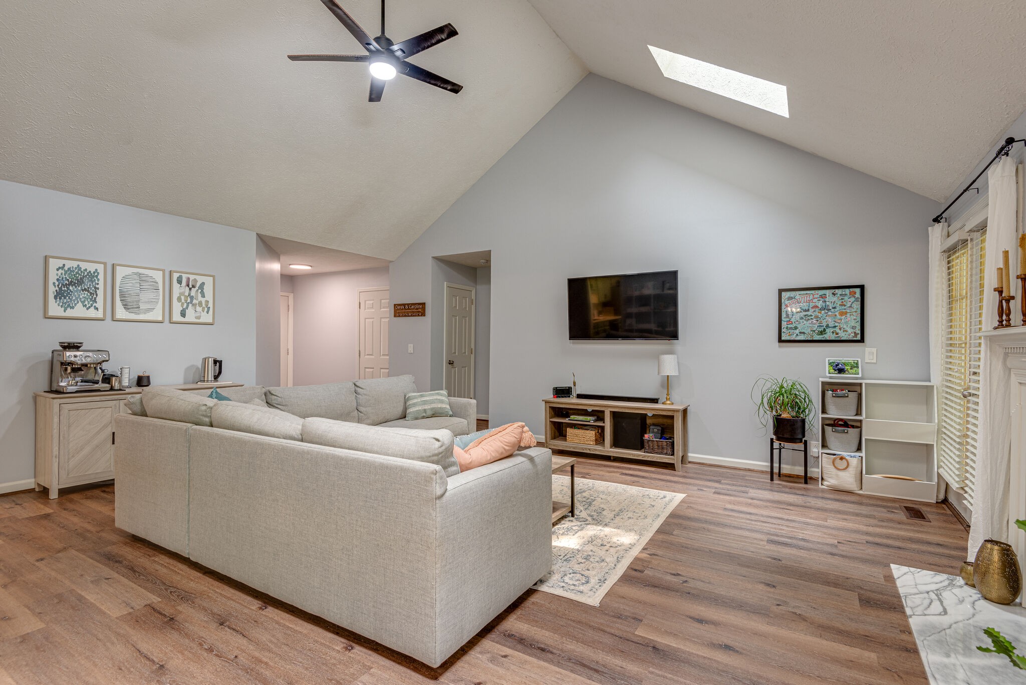 385 Cedarcliff Road Antioch, TN 37013 - Photo 8 of 29 a living room with furniture and a flat screen tv