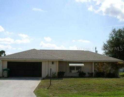 22153 Rochester Avenue Port Charlotte, FL 33952 - Photo 1 of 1 Exterior Front - FRONT YARD