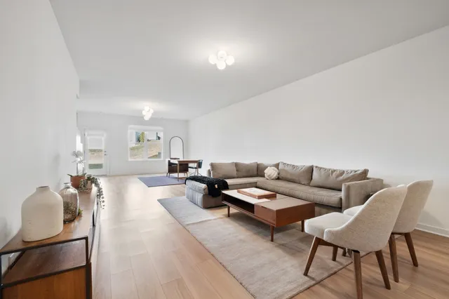 a living room with furniture and a couch