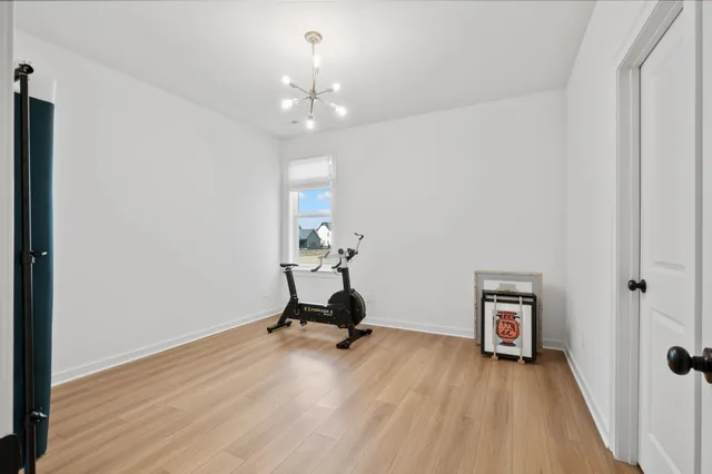 a view of roof deck with seating space and city view