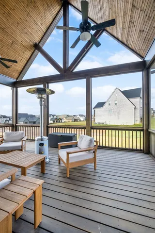 a living room with large windows