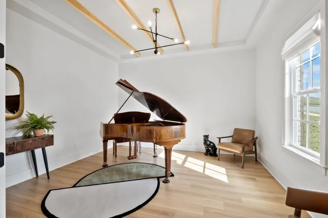 a room with furniture and wooden floor