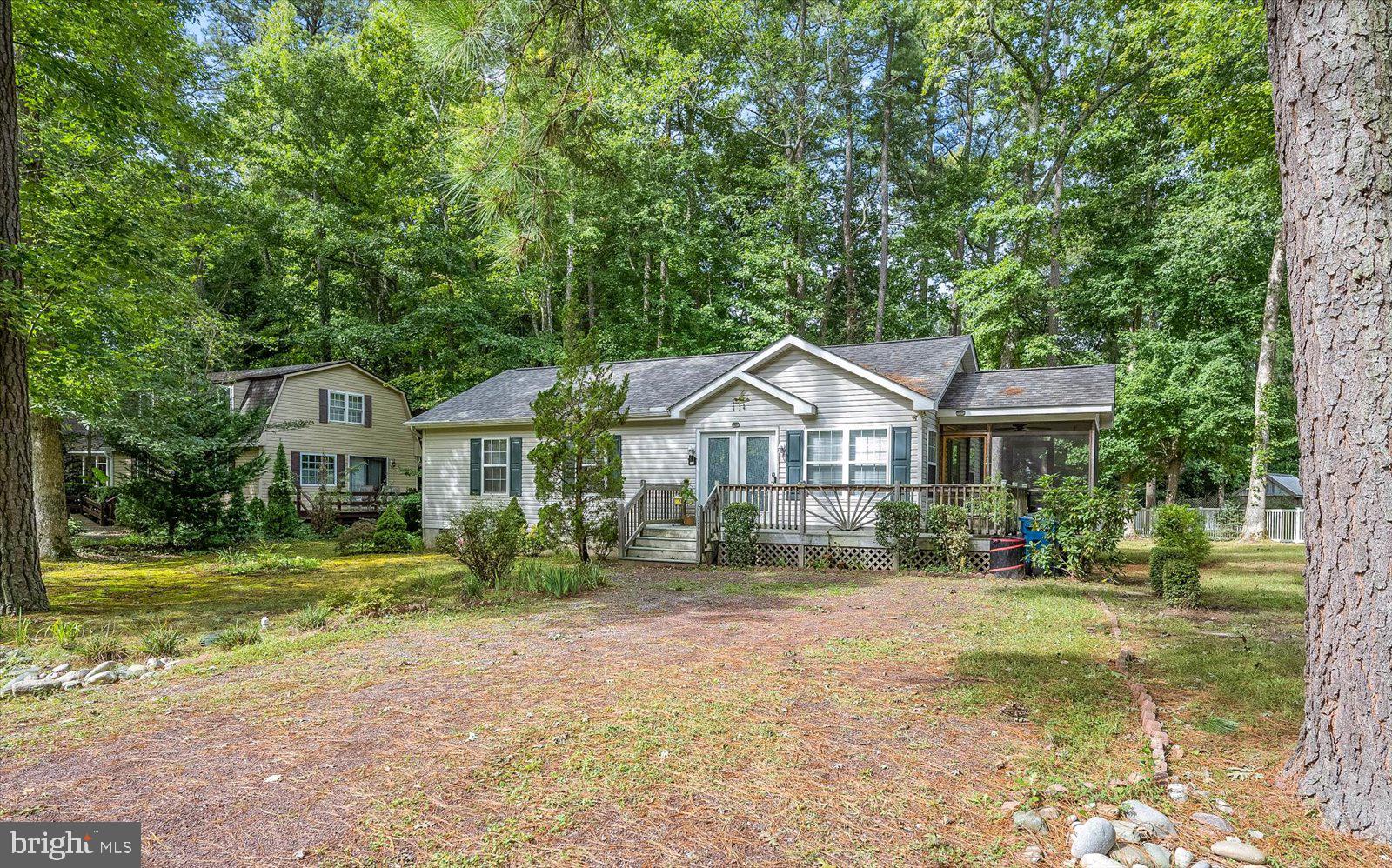 156 Sandyhook Road Berlin, MD 21811 - Photo 37 of 95 a front view of a house with a yard