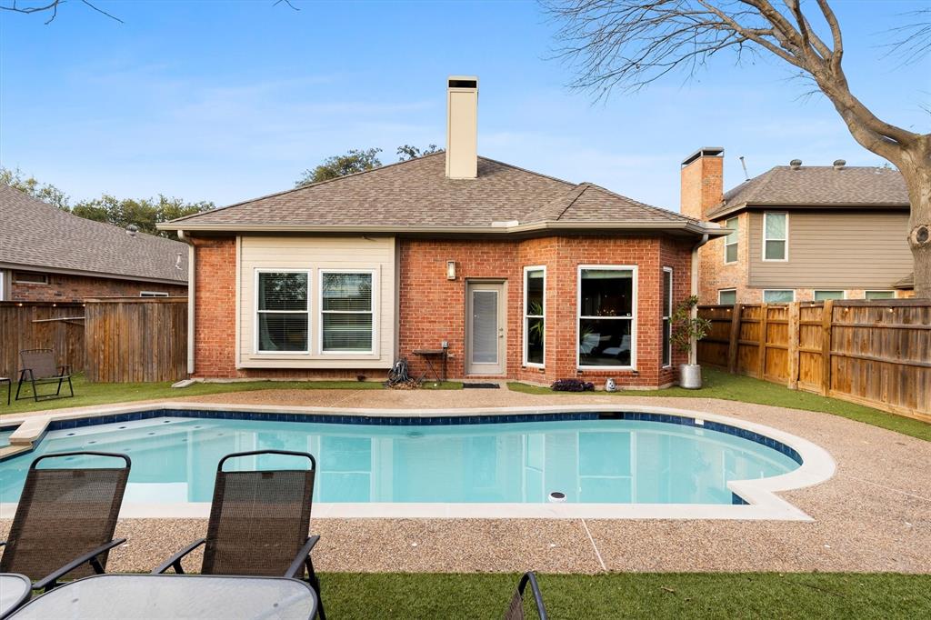 4008 Sherry Lane Addison, TX 75001 - Photo 28 of 39 a view of a house with a swimming pool